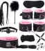Premium pink‑lined wellness accessories set featuring soft faux‑fur cuffs, blindfold, and comfort tools for couples
