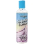 "California Dreamin' Ocean Mist Water-Based Lubricant bottle on a soft blue background."