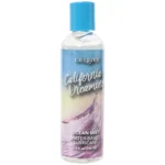 "California Dreamin' Ocean Mist Water-Based Lubricant bottle on a soft blue background."