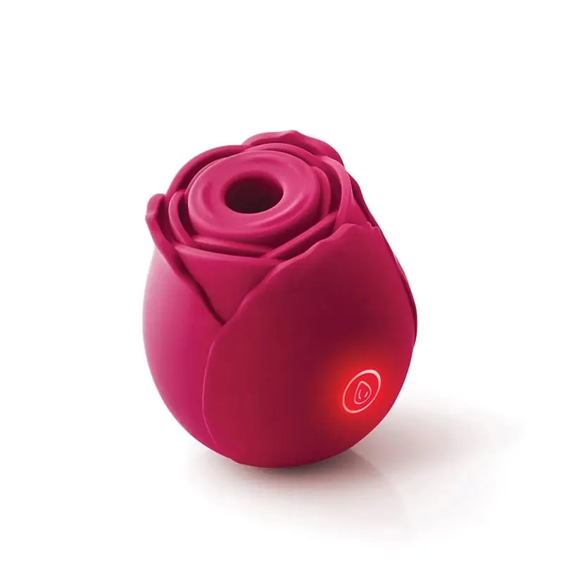 Red rose‑shaped silicone massager with petal‑style top opening and illuminated power button.